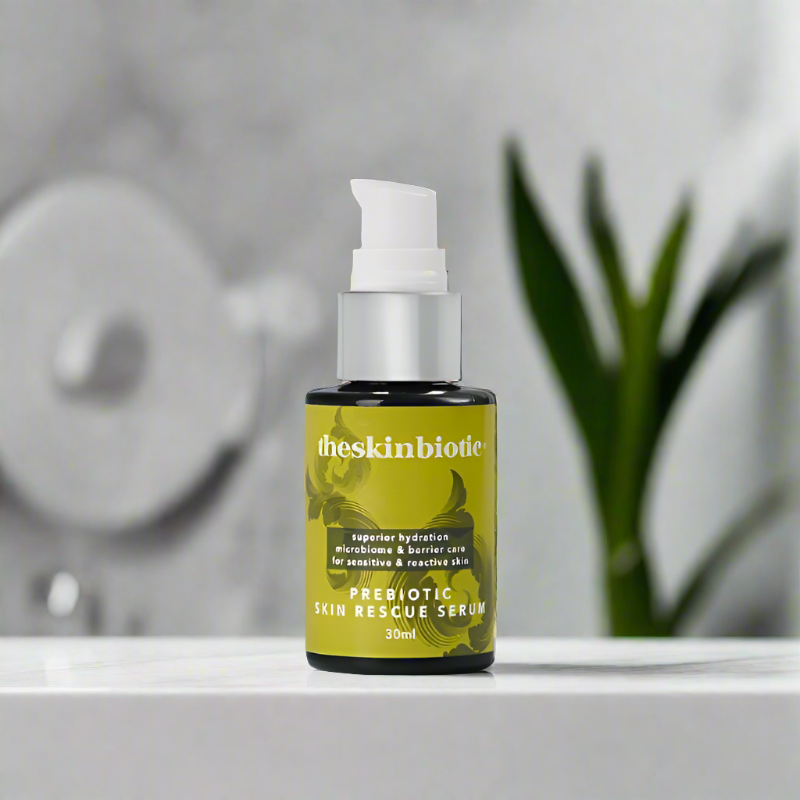 Prebiotic Skin Rescue Serum for Sensitive Skin bottle sitting on a bathroom bench