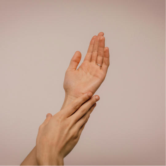 Applying prebiotic hand product on dry skin on the hands
